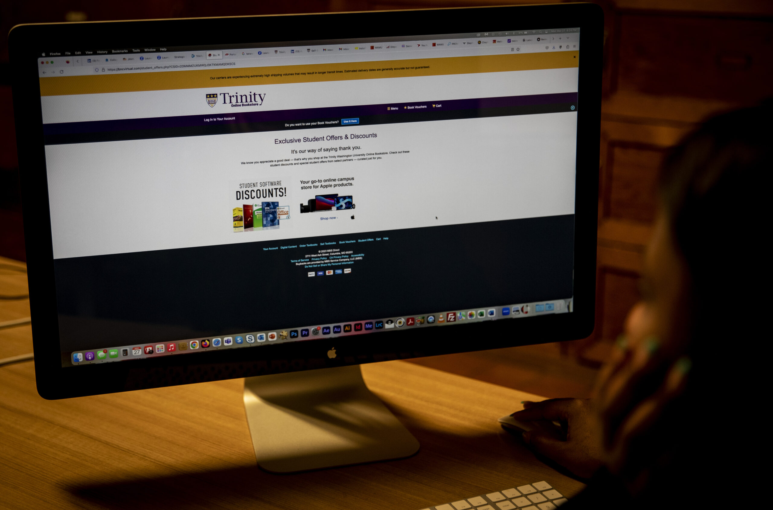 Student searches for textbooks on Trinity's online bookstore.